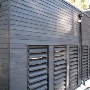 Black painted featheredge cladding on a barn conversion